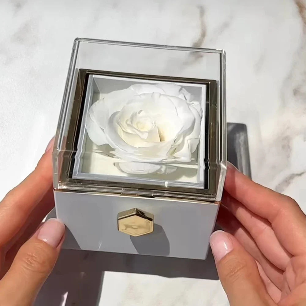 Box with rose and eternal jewelry as a souvenir